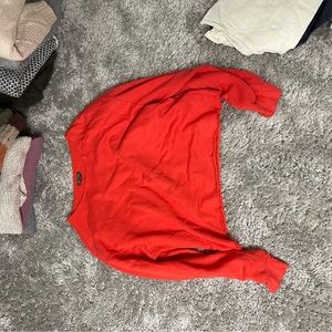Red cropped pullover. Cody inside. Size small.